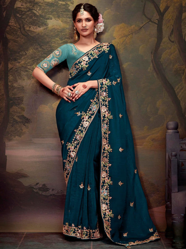 Bewitching Teal Blue Embroidered Silk Wedding Wear Saree With Blouse